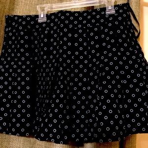 Black polkadot mini skirt